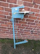 A FOOT OPERATED FRAMING TOOL