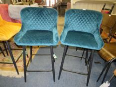 A PAIR OF MODERN GREEN UPHOLSTERED KITCHEN STOOLS