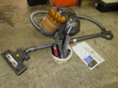A DYSON DC39 VACUUM CLEANER AND TOOLS