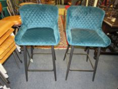 A PAIR OF MODERN GREEN UPHOLSTERED KITCHEN STOOLS