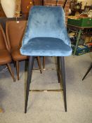 A MODERN UPHOLSTERED KITCHEN STOOL