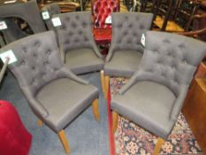 A SET OF FOUR MODERN UPHOLSTERED DINING CHAIRS