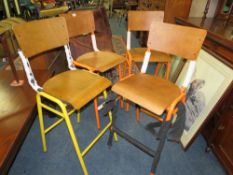 A HARLEQUIN SET OF FOUR INDUSTRIAL STYLE BAR STOOLS