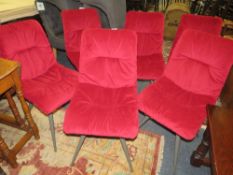 A SET OF SIX MODERN UPHOLSTERED MAROON VELVET EFFECT DINING CHAIRS