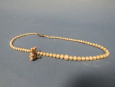 A PAIR OF 9CT WHITE GOLD & PEARL EARRINGS TOGETHER WITH A MATCHED NECKLACE HAVING SILVER CLASP