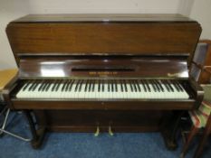 A ROBERT RAATHORNE & SON UPRIGHT PIANO