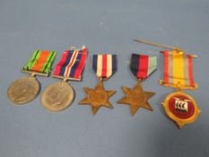 FOUR WORLD WAR II MEDALS TOGETHER WITH AN A.R.O.B. MEDAL (5)