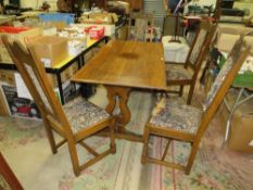 AN OAK OLD CHARM REFECTORY TABLE WITH FOUR CHAIRS EACH CHAIR WITH CARVED DEDICATION TO 'HRH PRINCE