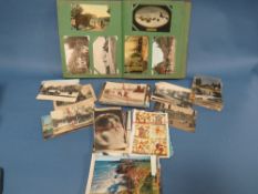 A VINTAGE POSTCARD ALBUM AND CONTENTS TOGETHER WITH A BOX OF POSTCARDS