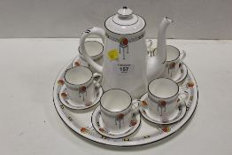 AN ART DECO PATTERN SHELLEY PART COFFEE SET COMPRISING COFFEE POT, TRAY, AND SIX COFFEE CANS AND