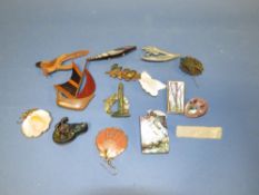 A SELECTION OF VARIOUS THEMED HANDCRAFTED BROOCHES
