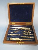 A VINTAGE MAHOGANY CASED TECHNICAL DRAWING SET