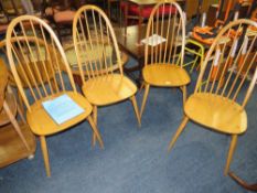 A SET OF FOUR ERCOL QUAKER DINING CHAIRS
