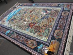 A LARGE MODERN EASTERN SILK RUG DECORATED WITH A MOUNTAINOUS HUNTING SCENE 250 X 360