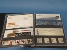 AN ALBUM OF FIRST DAY COVERS TO INCLUDE D-DAY