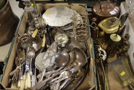 A TRAY OF ASSORTED METALWARE TO INCLUDE FLATWARE, PLACEMATS AND COASTERS, CANDLESTICKS TOGETHER WITH