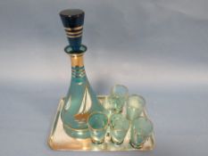 A RETRO SHIPS DECANTER WITH SIX GLASSES