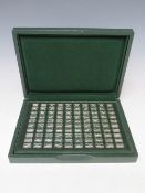 A CASED SET OF 100 MINIATURE SILVER CAR DESIGN INGOTS STAMPED 925 / 1000