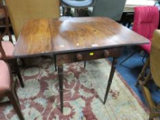 A 19TH CENTURY MAHOGANY PEMBROKE TABLE RAISED ON TURNED SUPPORTS