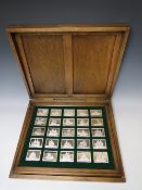 THE GREAT SAILING SHIPS OF HISTORY HALLMARKED SILVER SET OF 50 INGOTS IN BRASS BOUND FITTED OAK