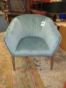 A MODERN TEAL UPHOLSTERED TUB ARMCHAIR