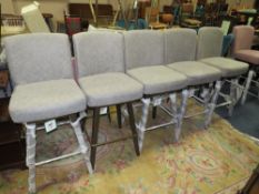 A SET OF FIVE MODERN SWIVEL KITCHEN STOOLS