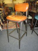 A TAN LEATHER & METAL KITCHEN STOOL