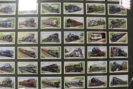 TWO FRAMED AND GLAZED CIGARETTE CARD DISPLAYS - GOLFING AND RAILWAY - A/F