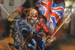 A FRAMED AND GLAZED IRON MAIDEN ADVERTISING POSTER FOR 'MAIDEN ENGLAND '88' DVD RELEASE - H 68 CM