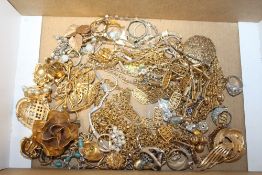 A LARGE QUANTITY OF YELLOW METAL AND OTHER COSTUME JEWELLERY