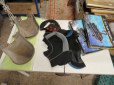 A SELECTION OF DIVING HOODS, DRY SUIT HANGERS, TANK NET AND CAST IRON WATER TROUGHS
