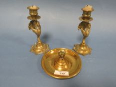 A PAIR OF EASTERN BRASS PEACOCK CANDLESTICKS TOGETHER WITH A FOX HEAD CIRCULAR DISH