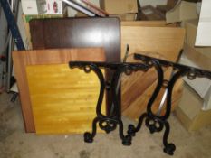 A SELECTION OF THICK WOODEN AND WORK TOPS TOGETHER WITH A CAST IRON PUB TABLE FRAME