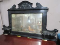 AN EDWARDIAN EBONISED OVER MANTLE MIRROR W-137 CM