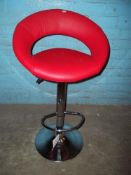 A CHROME RISE AND FALL BAR STOOL