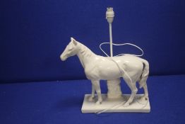 A TABLE LAMP IN THE FORM OF A HORSE