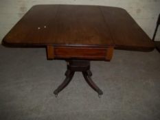 AN ANTIQUE MAHOGANY DROPLEAF TABLE