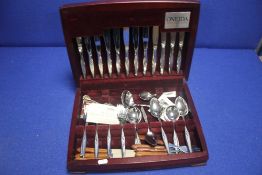 A CASED CANTEEN OF CUTLERY (STAINLESS STEEL)