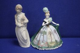 A COALPORT FOUR SEASONS FIGURINE 