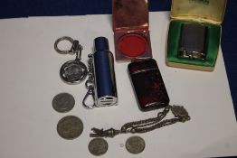 A BOX OF COLLECTABLES TO INCLUDE LIGHTERS, COINS ETC