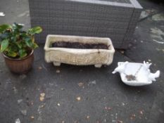 THREE GARDEN PLANTERS IN CONCRETE AND CERAMIC TO INCLUDE A DECORATIVE PLANT MANGER