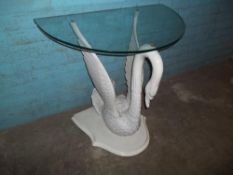 A SWAN SHAPED DEMI LUNE SOFA TABLE