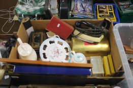A TRAY OF SUNDRIES TO INCLUDE A MONEY BOX, VINTAGE IRON ETC (TRAYS NOT INCLUDED),br.