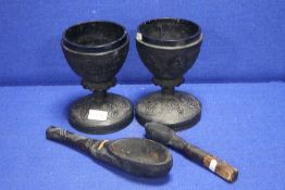 TWO CARVED GOBLETS TOGETHER WITH 2 CARVED SPOONS