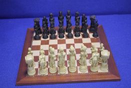 A BOXED STUDIO ANNE CARLTON CHESS SET ,BATTLE OF WATERLOO,