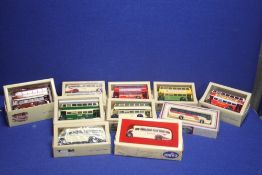 A COLLECTION OF 10 BOXED CORGI BUSES TO INCLUDE GUY ARAB