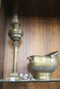 A BRASS COAL BUCKET TOGETHER WITH A BRASS LAMP