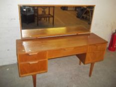 A RETRO TEAK DRESSING TABLE