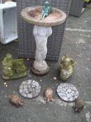 NINE ITEMS TO INCLUDE A CONCRETE BIRD BATH, STEPPING STONES AND STATUES