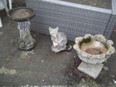 A CONCRETE BIRD BATH, A STATUE AND A PLANTER